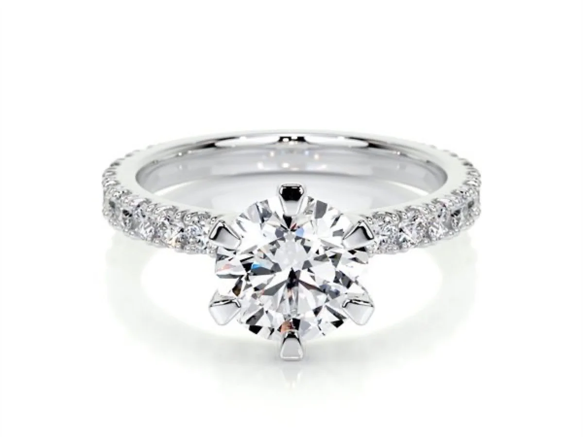 Partial-set anniversary band with sizing bar, manufactured by Vesta Jewelry