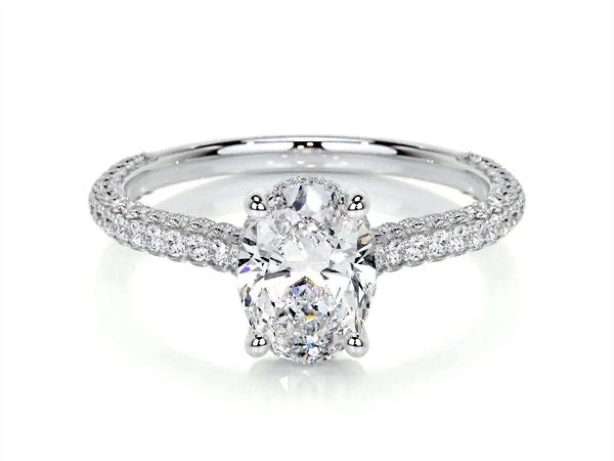 Halo and hidden halo engagement ring with pavé-set melee, manufactured by Vesta Jewelry