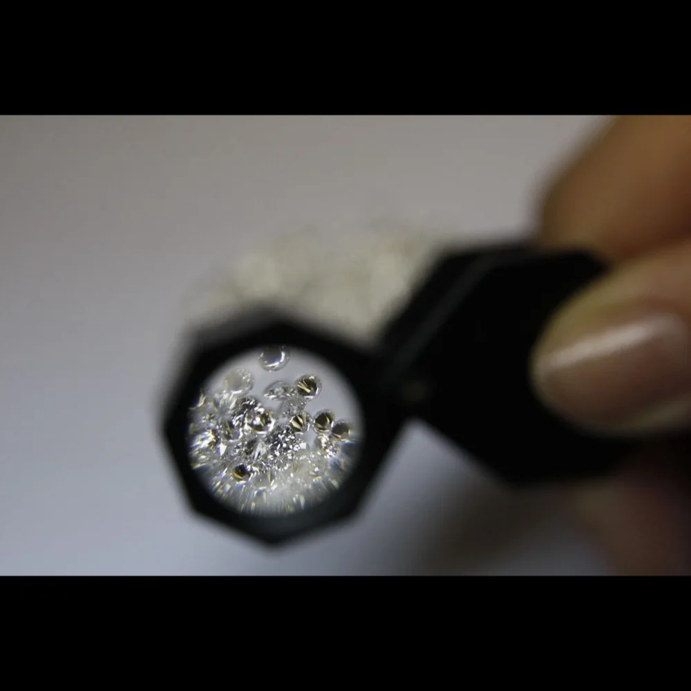 Quality control inspection of finished jewelry at Vesta Jewelry